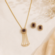 GOLD PLATED PENDANT SET WITH STONE STUDDS
