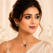 GOLD PLATED PENDANT SET WITH STONE STUDDS